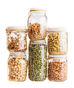 以玻璃罐种植的不同种子堆叠式堆放植物发芽居住生活食物玻璃幼苗小麦工作室粮食图片