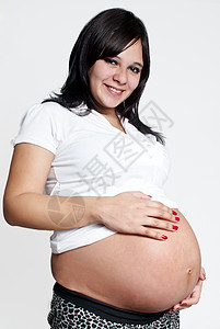 轻背景孕妇的光背面肖像父母胎儿女性成人拥抱母亲快乐福利分娩保健图片