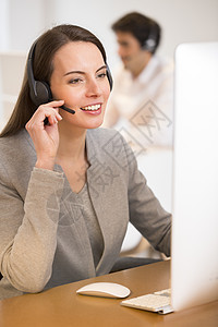 配备办公室计算机 头盔的求助电话接线员秘书商务网络女孩电脑商业视频女性接待员女士图片