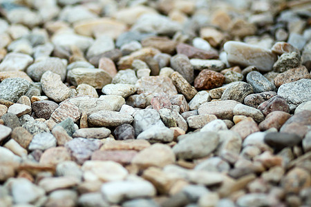 Pebbles 纹理圆形材料黑色花园卵石海滩岩石鹅卵石石头矿物图片