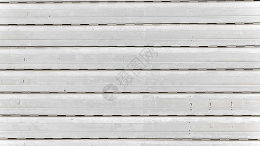 红色门的灰钢墙灰色白色金属材料抛光工业墙纸特写入口背景图片