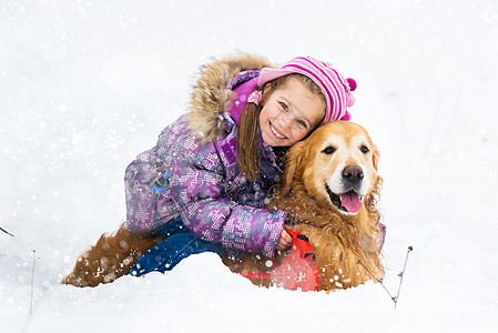 配有金色采金器的女孩雪花乐趣毛皮帽子犬类家庭女性猎犬快乐季节图片