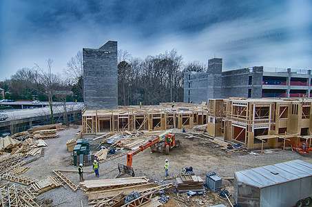 城市中繁忙的建筑工地地面安全活动构造工人蓝色工业材料工程金属图片