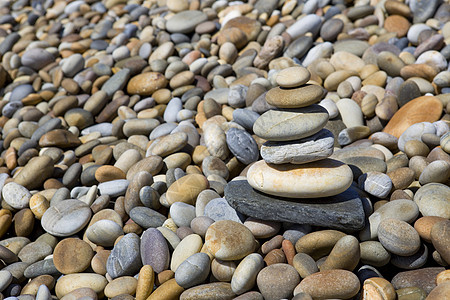 碎石石灰色海滩白色温泉支撑岩石圆形黑色宏观圆圈图片