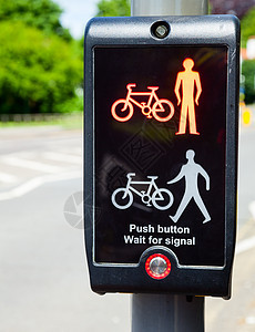 Toucan 跨越绿色信号运输基础设施海雀红灯红绿灯人行道红色冒险行人自行车图片