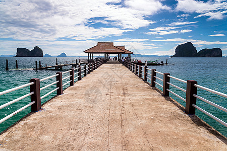 泰国Koh Ngai岛的Andaman海景太阳港口蓝色运输码头风暴风化冲浪海港艺术图片
