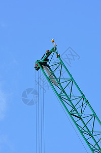 建筑起重机工业金属天空吊装电缆商业工程蓝色三角帆绿色图片