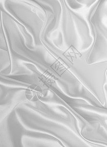 平滑优雅的白色丝绸作为背景投标感性新娘织物涟漪曲线布料材料婚礼银色图片