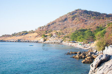 高四长太阳天堂悬崖蓝色岩石海景阳光风景海浪热带图片