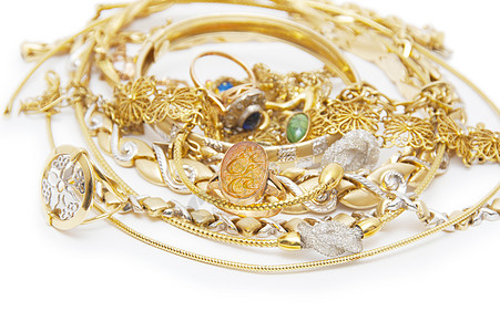 大量金首饰的收藏奢华宝石戒指女性化宏观金属珠宝石头珠子项链图片