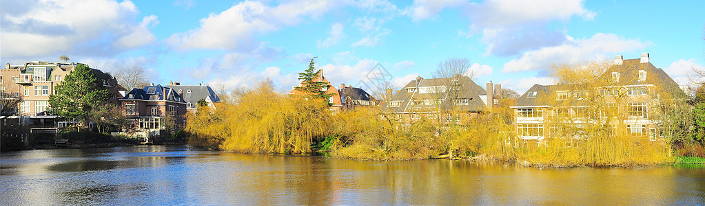 阿姆斯特丹建筑旅行村庄小屋太阳建筑学文化房子旅游城市场景图片