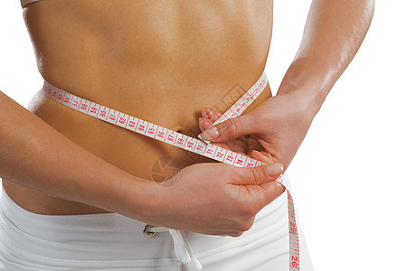 腰部的年轻运动女性肥胖健身房饮食训练营养减肥磁带身体测量皮肤图片