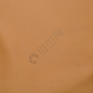 棕色皮革纹理剪接制品纺织品折痕质量标签材料奶牛皮肤奢华动物图片