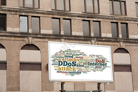 在砖墙上挂有 DDOS 字云符号的广告广告公告牌城市营销建筑物建筑学水平建筑金融框架商业办公室图片
