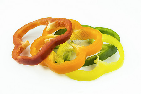 色彩多彩的甜甜胡椒片香料烹饪美食蔬菜胡椒饮食卫生辣椒保健橙子图片