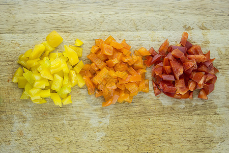 色彩多彩的甜甜胡椒片辣椒烹饪美食保健橙子营养卫生食物饮食胡椒图片