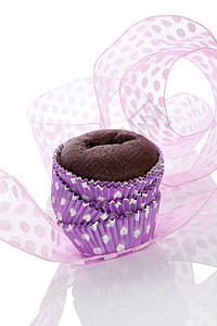 巧克力纸杯蛋糕丝带甜食烹饪小吃饮食甜点美食食物紫色漩涡图片