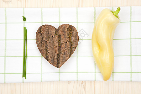 我们热爱健康的食物心形健康饮食蔬菜草本植物辣椒概念厨房早餐农业香葱图片