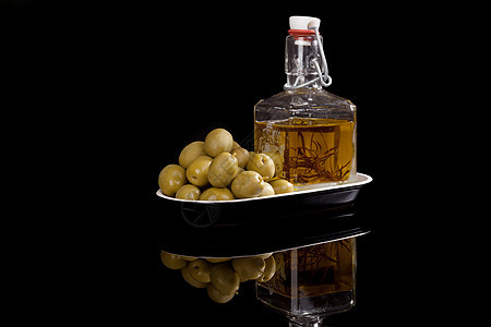 橄榄和橄榄油黄色调味品食物美食烹饪奢华瓶子水果图片