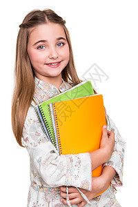 小学生持有笔记本童年背包教育书包大学职业女孩微笑女学生孩子图片
