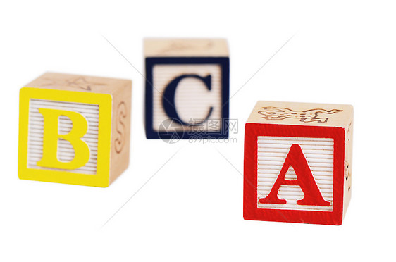 在白色背景上孤立的木制立方体语言学习玩具木头正方形字母游戏英语学校建筑图片