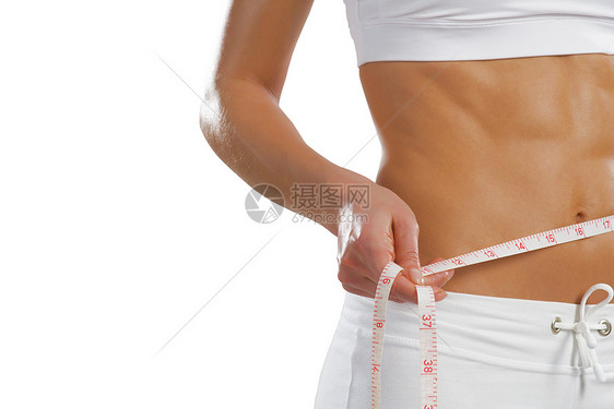 腰部的年轻运动女性女孩腹部女士食物饮食重量组织身体水果成人图片