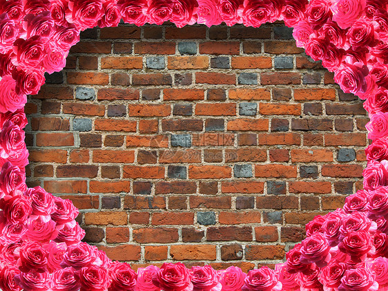 由玫瑰和红砖墙制成图片