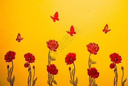 墙花花水泥花园蝴蝶红色黄色背景图片