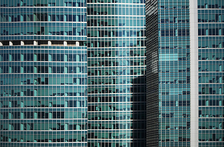 现代办公大楼玻璃窗外面详细细节城市金融中心商业线条正方形工业摩天大楼反射蓝色图片