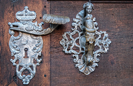 布拉格旧门前门的门式装饰装置细节腐蚀城堡青铜手工历史房子教会入口金属艺术图片