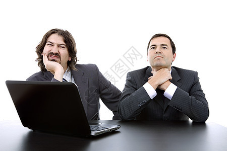 担心的伙伴生意人管理人员会议技术笔记本人士桌子商务成人图片