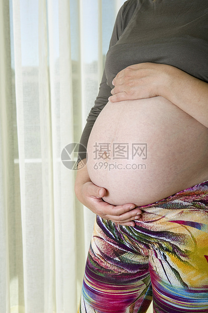 孕妇喜悦生活妻子女士家庭腹部女性卫生保健白色图片