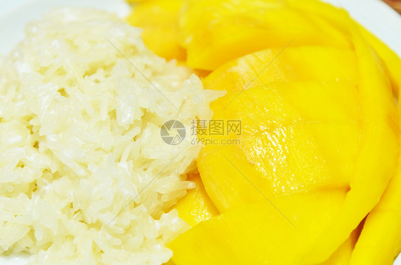 甘甜大米与芒果共食水果小册子叶子椰子果汁热带甜点午餐奶油美食图片