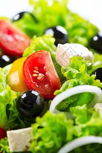 希腊沙拉 与Feta奶酪 番茄和橄榄结合餐厅蔬菜草药食物饮食洋葱美食叶子山羊菜单图片