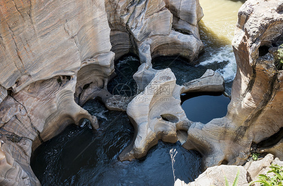 非洲南部的波尔克斯河水坑洞基岩运气溪流峡谷编队旅游漩涡荒野鹅卵石侵蚀图片