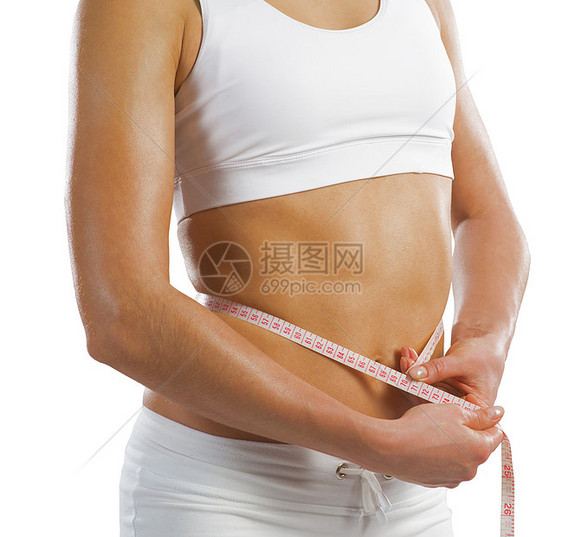 腰部的年轻运动女性数字腹部磁带腰围橘皮重量营养健身房身体测量图片