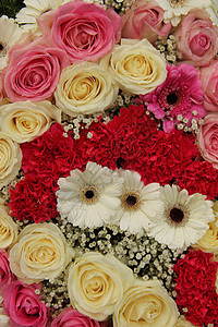 粉色和白色的婚礼安排植物群仪式婚姻新娘中心玫瑰花朵浪漫花瓣花束背景图片