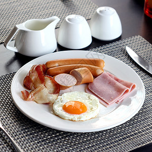 早餐餐橙子盘子咖啡食物果汁火腿熏肉面包餐厅油炸图片