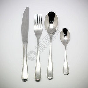 叉子和刀陶瓷盘子宴会早餐厨房晚餐午餐桌子餐具桌布图片
