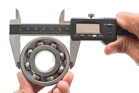 使用vernier 的人毫米力学教育千分尺测量乐器工作工具机械厘米图片