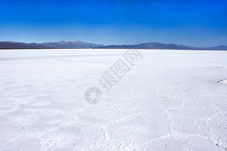 阿根廷Jujuy的水池天空太阳岩石反射蓝色盐水土地吸引力矿物图片