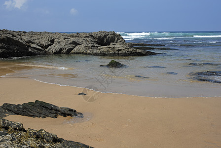 海滩沙滩地标环境砂岩日落反射风景场景镜子悬崖岩石图片