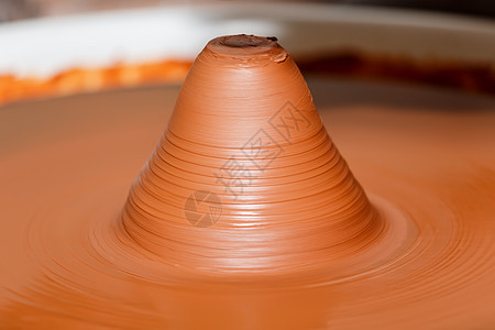 与粘土一起工作制品纺纱艺术品黏土创造力陶器花瓶运动圆圈手指图片
