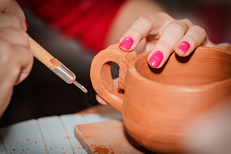 手制的波特手工艺术家拇指模具制品陶器手指工艺陶瓷车轮图片