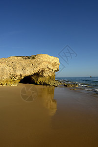 海滩沙滩旅行风景悬崖环境反射场景橙子国家日落日出图片