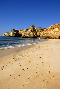 海滩沙滩橙子地标岩石环境国家日落镜子娱乐日出旅行图片