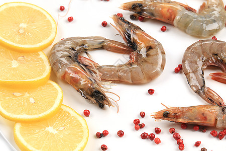 盘子里有生虾 关门甲壳动物饮食养殖营养海鲜食物贝类柠檬白色图片