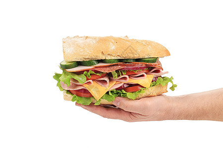 新的大三明治在手里垃圾食物芝麻蔬菜小吃种子熏制沙拉火腿面包图片