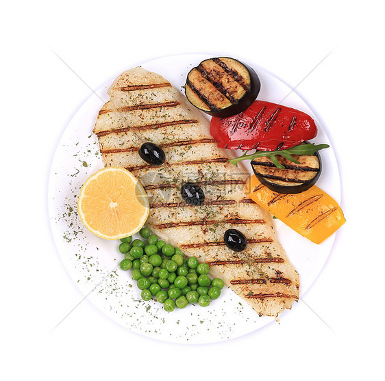 盘子上有灰色的长尾鱼柠檬煤炭产品植物炙烤食物绿色油炸美食熟食图片