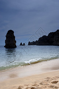 海滩沙滩国家环境旅行砂岩镜子场景岩石橙子娱乐风景图片